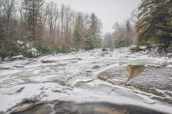 Wide angle view of the top of the ice covered Cascades at Ohiopyle State Park