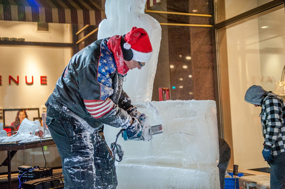 A statue is carved out of ice in Pittsburgh during Light Up NIght