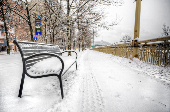 Snowy bench in Pittsburgh HDR