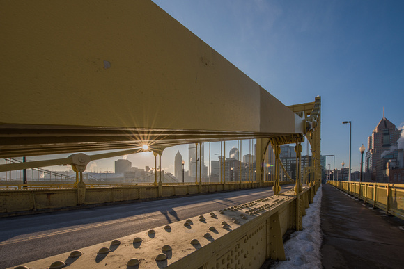 A sunflare through the Clemente Bridge in Pittsburgh