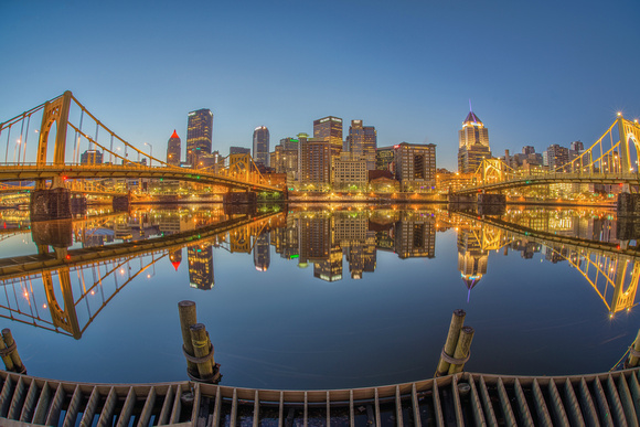 A fisheye reflection of the Pittsburgh skyline just before sunrise HDR