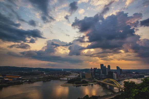 Dramatic clouds over the Pittsburgh skyline at sunrise