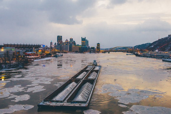 Barge on the icy Ohio River in Pittsburgh