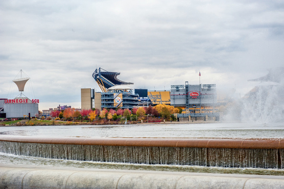 Looking through the fountain towards Heinz Field in the fall in Pittsburgh