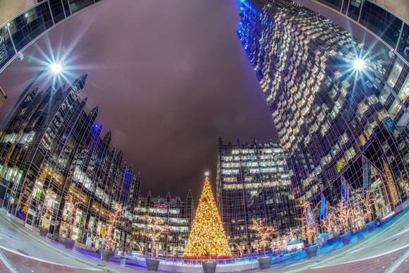 A fisheye view of the Christmas tree at PPG Place at night