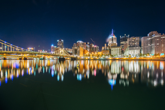 Early morning reflections of Pittsburgh in the Allegheny River