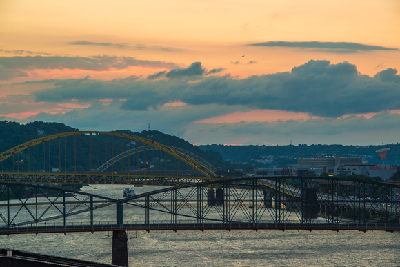Colorful sky over Pittsburgh bridges