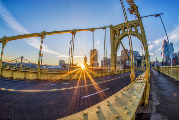 Sunflare through the Roberto Clemente Bridge in the morning HDR
