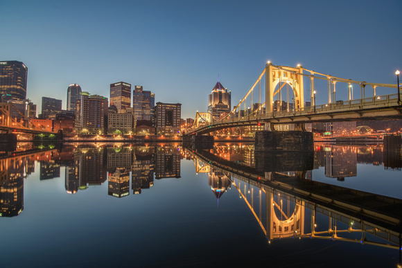 The Roberto Clemente Bridge in Pittsburgh reflects in the Allegheny River HDR