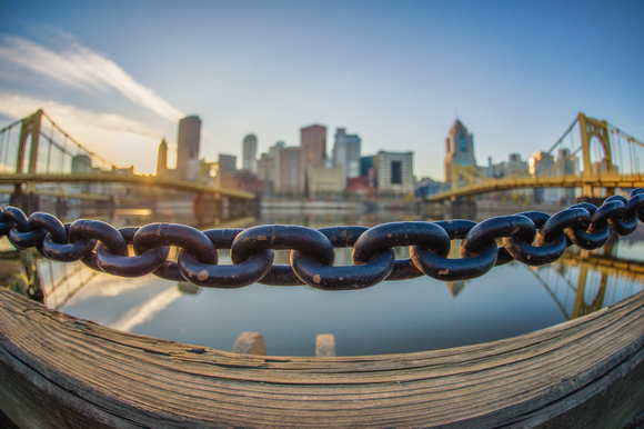Fisheye view of the Pittsburgh skyline and a chain along the river HDR