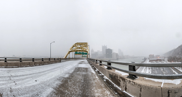 Panorama of a snowy Ft. Pitt Bridge in Pittsburgh