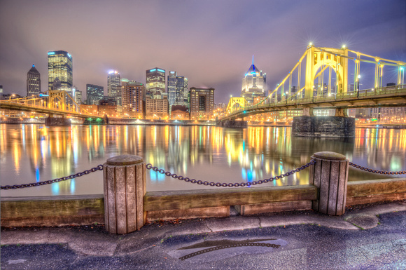 Clemente Bridge and chain reflections on the North Shore of Pittsburgh at night HDR