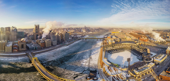 Panorama of the icy Allegheny and PNC Park covered in snow in Pittsburgh
