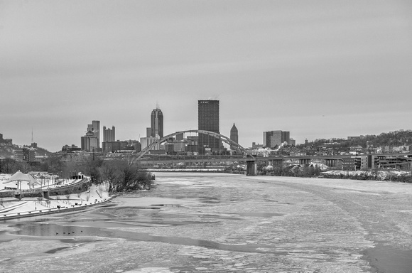 Pittsburgh over the icy Monongahela River from the Hot Metal Bridge in the winter