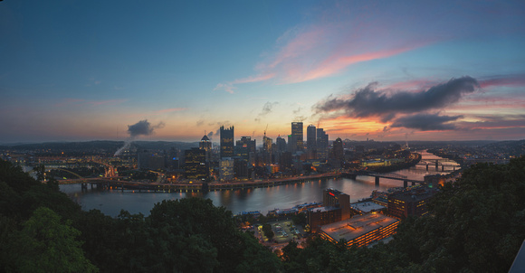 Panorama of a colorful sunrise over the Pittsburgh skyline