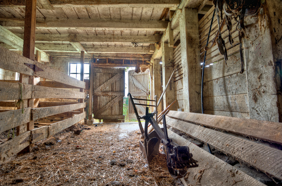 Inside of barn and plow HDR