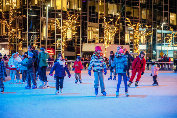 People enjoy the ice rink at PPG Place in Pittsburgh