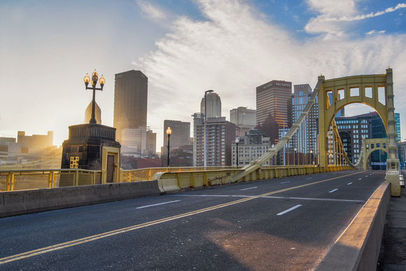 A view down the Roberto Clemente Bridge at sunrise in Pittsburgh HDR
