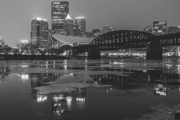 Black and white view of the Pittsburgh skyline on an icy morning