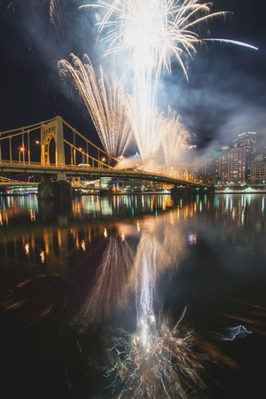 Reflections of the fireworks for Light Up Night in Pittsburgh