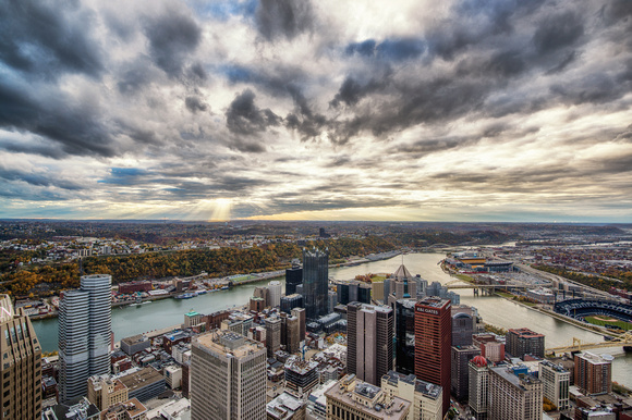 Clouds and downtown Pittsburgh in the fall from the roof of the Steel Building
