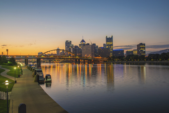 Pittsburgh skyline glows at dawn from the North Shore