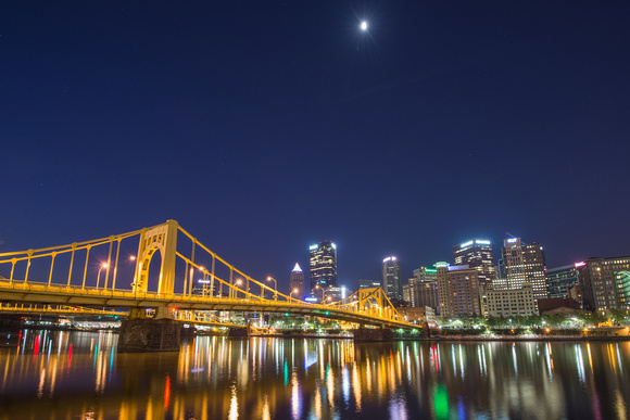 Moon over the Pittsburgh skyline on a clear morning in Pittsburhg