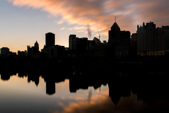Long exposure of clouds over Pittsburgh at dawn