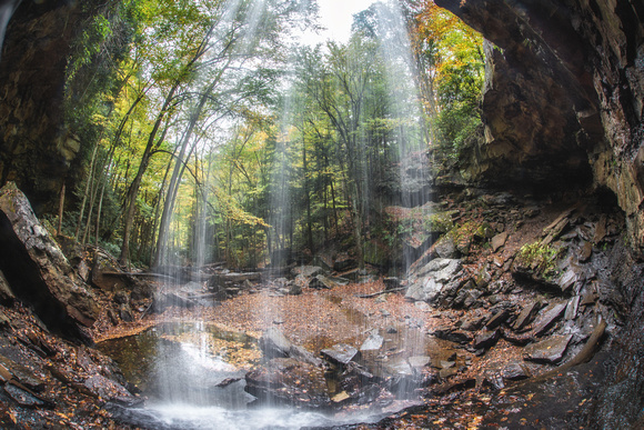 A fisheye view from behind Cucumber Falls at Ohiopyle State Park in the fall HDR