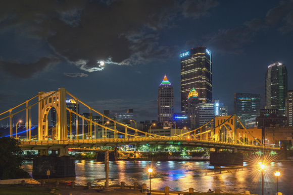 Clouds race by the Supermoon in Pittsburgh