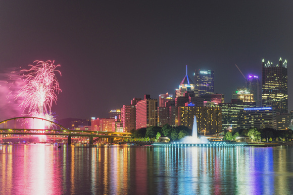 Red fireworks by Pittsburgh after a Pittsburgh Pirates baseball game