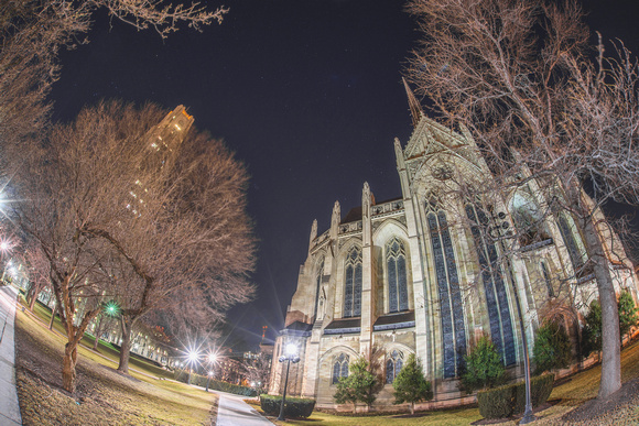 A fisheye view of the Cathedral of Learning and Heinz Chapel at night
